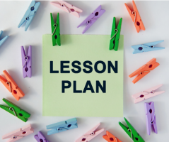 A sticky note with the words Lesson Plan surrounded by multi-colored clothes pins