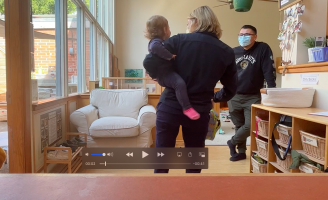 Screenshot from one of the Swivl videos showing a child-caregiver interaction.